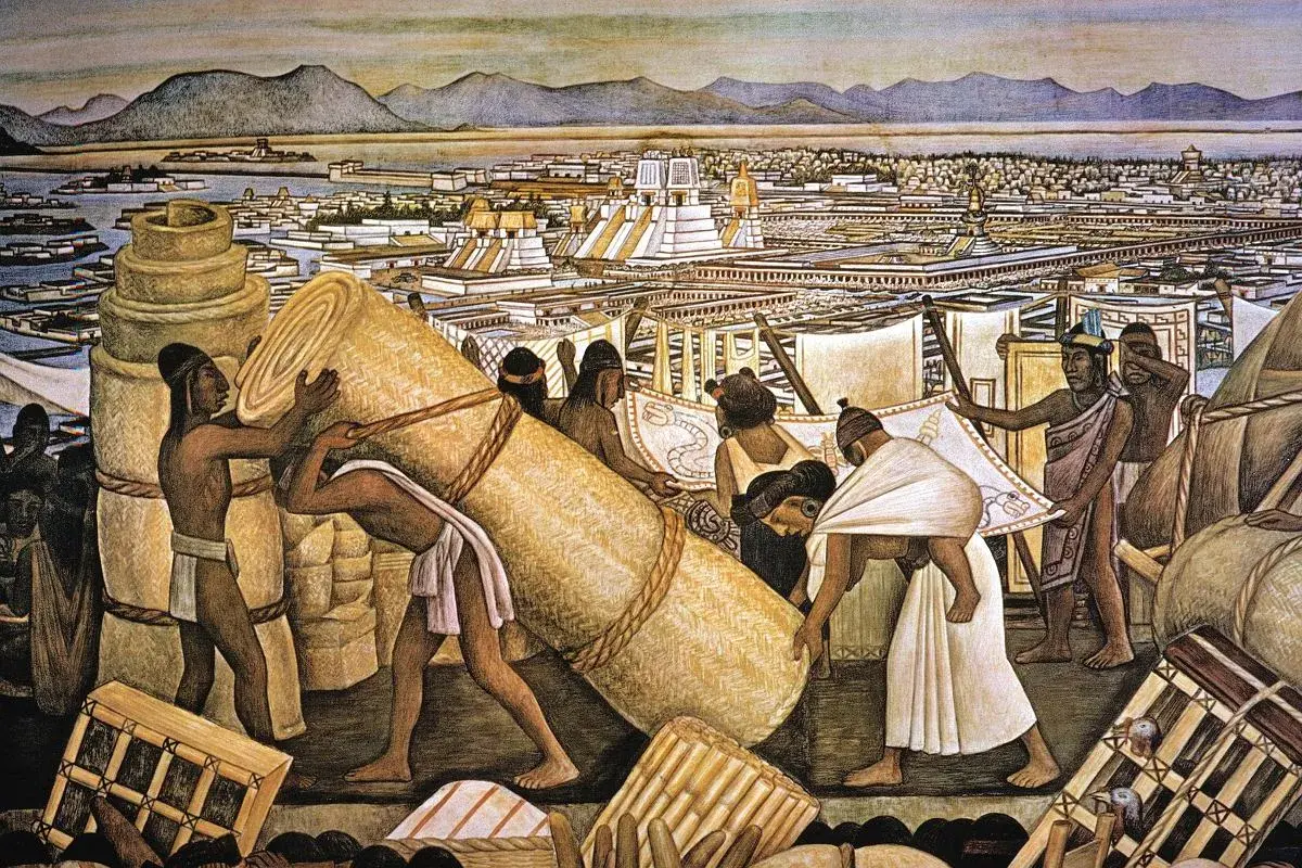Aztekowie transportują wielkie zwoje mat i tkanin na tle tętniącego życiem miasta Tenochtitlan.